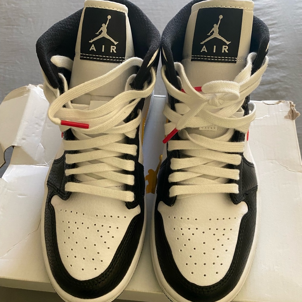 Softly used Jordan 1 high top sneakers.  Multi color size 7